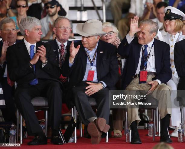 Former Vice President Dick Cheney and former Secretary of Defense Donald Rumsfeld are acknowledged during the commissioning of the USS Gerald R. Ford...