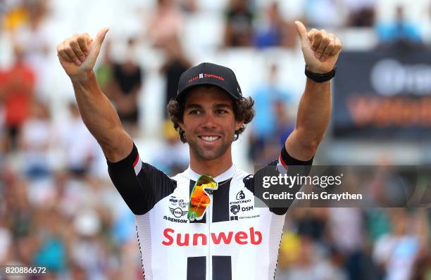 Michael Matthews of Australia and Team Sunweb puts on the green jersey during stage twenty of Le Tour de France 2017 on July 22, 2017 in Marseille,...