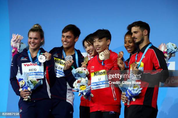 Silver medalists Grace Reid and Tom Daley of Great Britain, gold medalists Han Wang and Zheng Li of China and bronze medalists Jennifer Abel and...