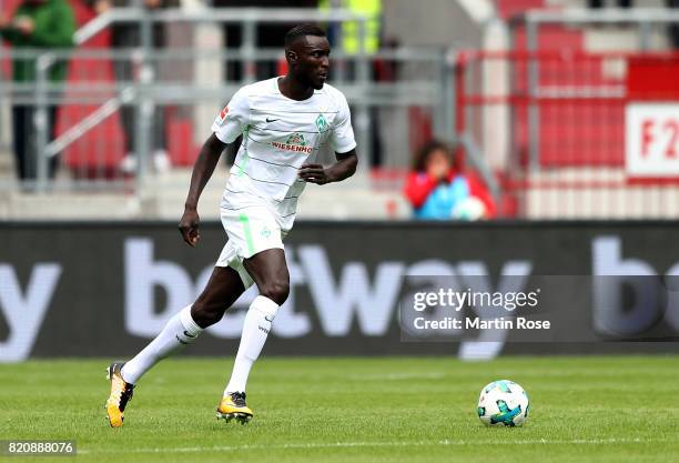 Ludovic Lamine Sane of Bremen runs with the ball during the preseason friendly match between FC St. Pauli and Werder Bremen at Millerntor Stadium on...