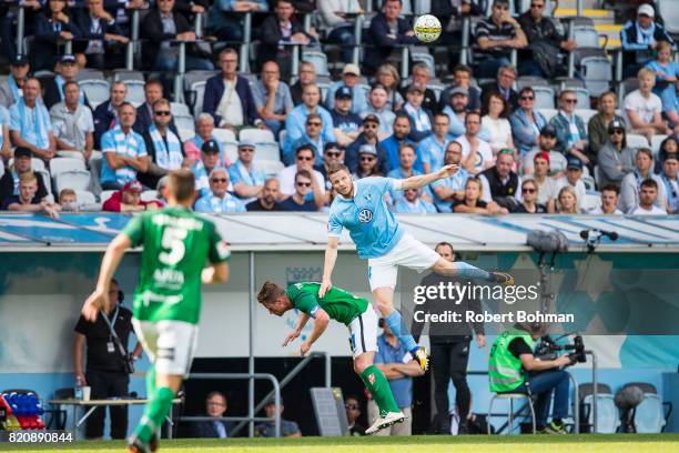 Tommy Thelin of Jonkopings Sodra and Lasse Nielsen of Malmo FF during the Allsvenskan match between Malmo FF and Jonkopings Sodra IF at Swedbank...