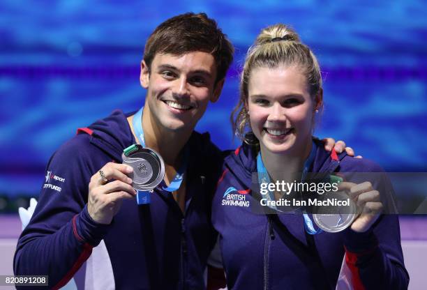 Tom Daley and Grace Reid of Great Britain pose with their silver medals from the Mixed 3m Synchro Springboard during day nine of the FINA World...