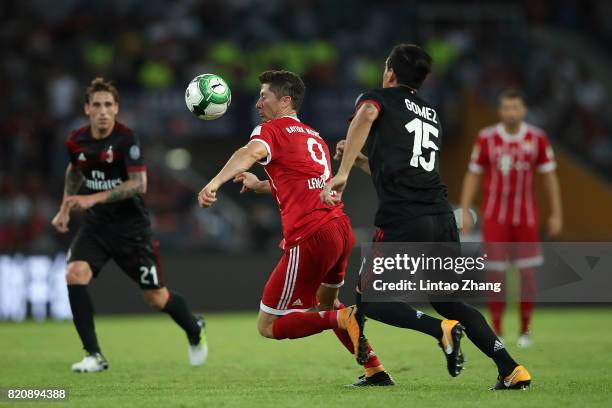 Robert Lewandowski of FC Bayern competes for the ball with Gustavo Gomez of AC Milan during the 2017 International Champions Cup China match between...