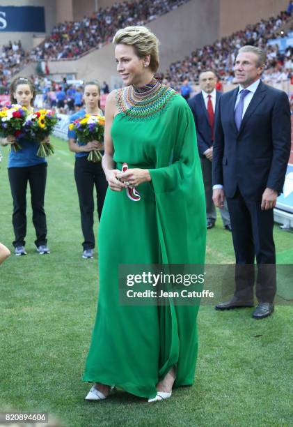 Princess Charlene of Monaco and Sergey Bubka participate at the medals ceremony during the IAAF Diamond League Meeting Herculis 2017 on July 21, 2017...