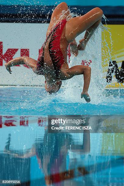 Germany's Amelie Ebert competes in the Mixed duet Free Routine preliminary during the synchronised swimming competition at the 2017 FINA World...