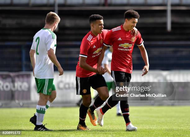 Nishan Burkart of Manchester United celebrates after scoring during the NI Super Cup game between Manchester United u18s and Northern Ireland u18s at...
