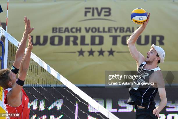 Germany's Lars Fluggen attacks while men's semifinal during FIVB Grand Tour - Olsztyn: Day 4 on July 22, 2017 in Olsztyn, Poland.