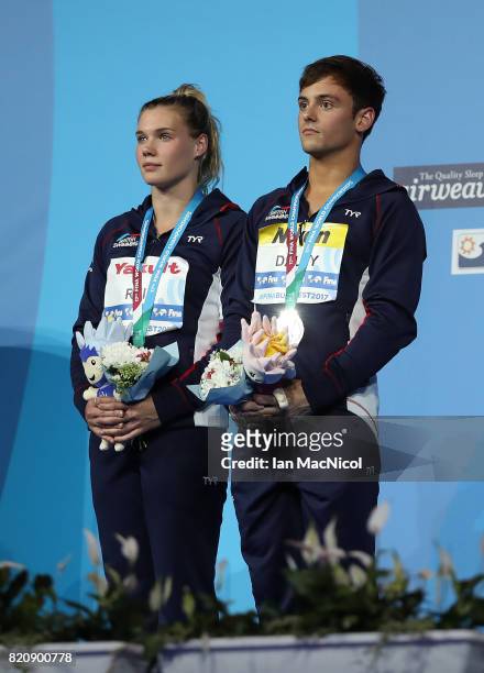 Tom Daley and Grace Reid of Great Britain pose with their silver medals from the Mixed 3m Synchro Springboard during day nine of the FINA World...