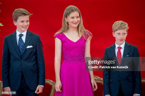 Princess Elisabeth of Belgium, Prince Gabriel of Belgium and Prince Emmanuel of Belgium attend the military parade on the occasion of the Belgian...