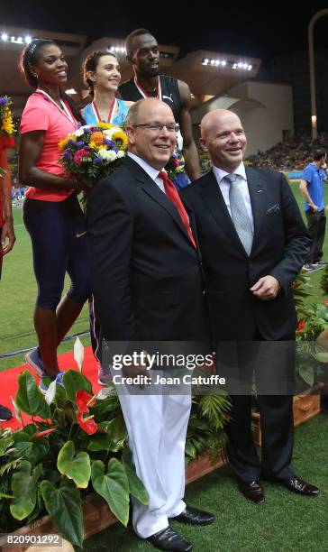 Prince Albert II of Monaco greets Usain Bolt of Jamaica after his victory in his last 100m in a meeting during the IAAF Diamond League Meeting...