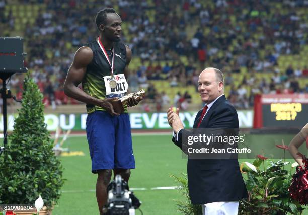 Prince Albert II of Monaco greets Usain Bolt of Jamaica after his victory in his last 100m in a meeting during the IAAF Diamond League Meeting...