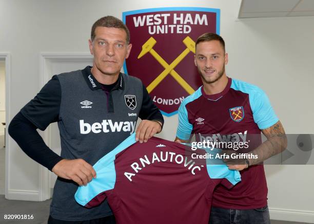 Slaven Bilic of West Ham United Unveils New signing Marko Arnautovic at Rush Green Training Ground on July 22, 2017 in London, England.