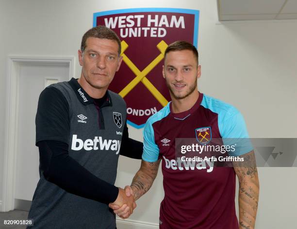 Slaven Bilic of West Ham United Unveils New signing Marko Arnautovic at Rush Green Training Ground on July 22, 2017 in London, England.