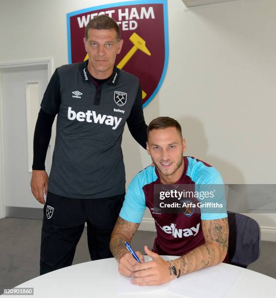 Slaven Bilic of West Ham United Unveils New signing Marko Arnautovic at Rush Green Training Ground on July 22, 2017 in London, England.