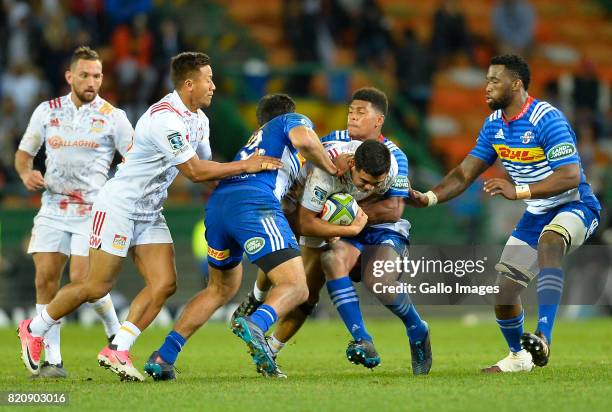 Solomon Alaimalo of the Chiefs tackled by Damian Willemse of the Stormers and Damian de Allende of the Stormers during the Super Rugby Quarter final...