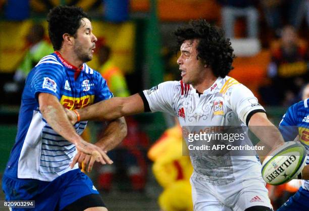 Chiefs' James Lowe runs with the ball during the Super Rugby quarter-final rugby union match between the Stormers and Chiefs at Newlands Stadium in...