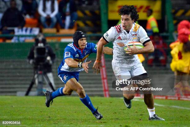 Chiefs' James Lowe vies with Stormers' Cheslin Kolbe during the Super Rugby quarter-final rugby union match between the Stormers and Chiefs at...