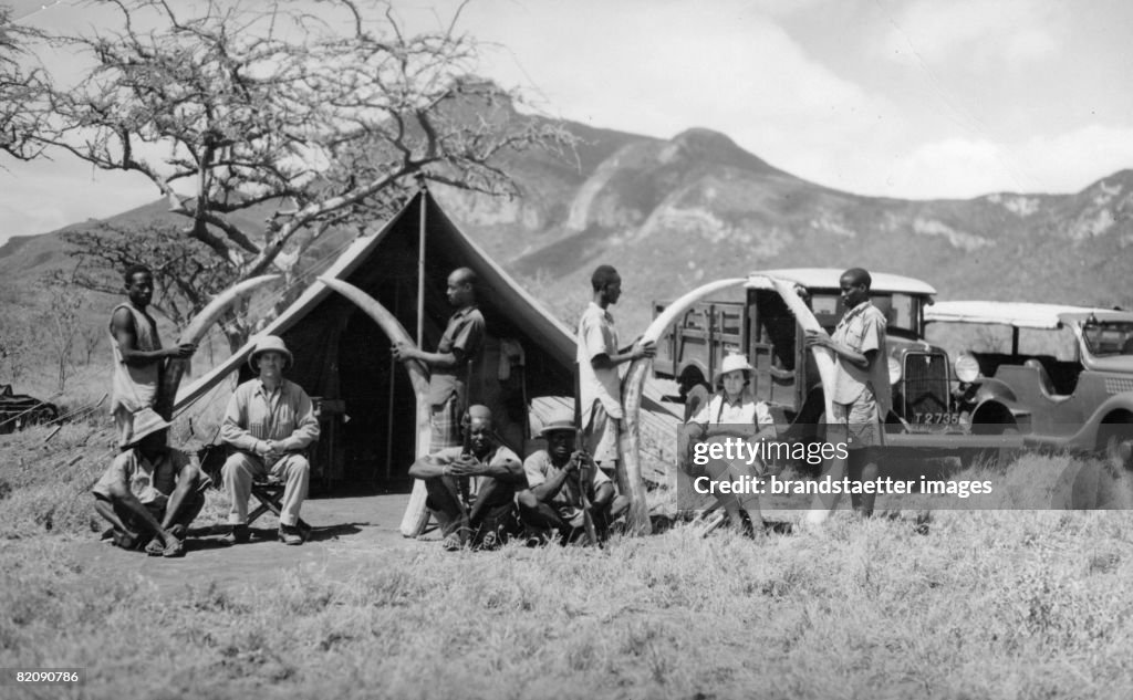 Big game hunter with hunting trophies, Photograph, Around 1935