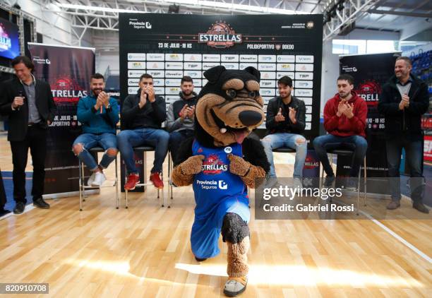 The mascot Rosco poses with the players during the 20th Liga Nacional All-Star Game Launch at Roberto Pando Sports Center of San Lorenzo on July 22,...