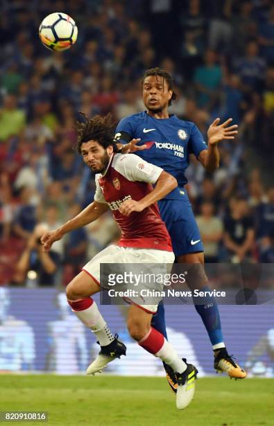 Mohamed Elneny of Arsenal and Loic Remy of Chelsea compete for the ball during a friendly match between Chelsea and Arsenal at Birds Nest on July 22,...
