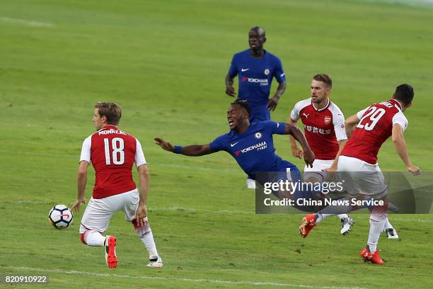 Granit Xhaka of Arsenal and Michy Batshuayi of Chelsea compete for the ball during a friendly match between Chelsea and Arsenal at Birds Nest on July...