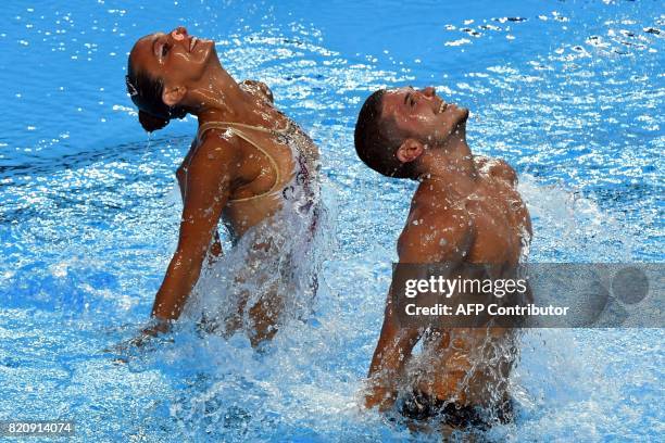Italy's Giorgio Minisini and Italy's Mariangela Perrupato compete in the Mixed duet Free Routine preliminary during the synchronised swimming...