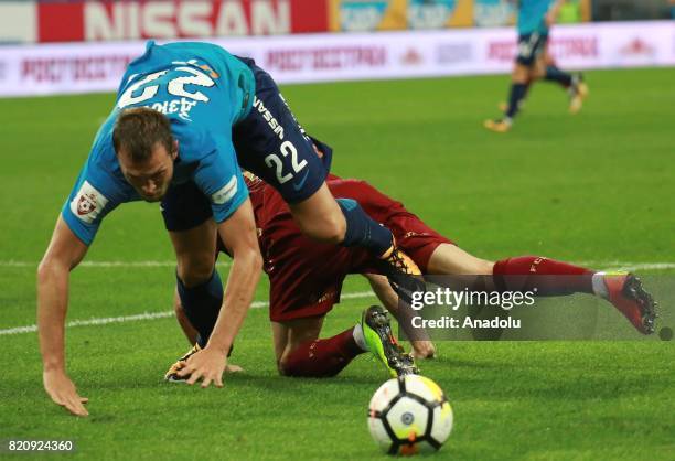 Artyom Dzuba of Zenit in action against his opponent of Rubin Kazan during the Russian Football Premier League match between Zenit St. Petersburg vs...