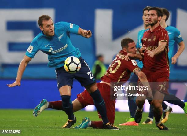 Artyom Dzuyba of Zenit in action against Fedor Kudryashov of Rubin Kazan during the Russian Football Premier League match between Zenit St....