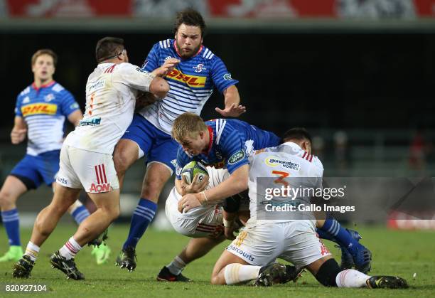 Pieter-Steph du Toit of the Stormers while Frans Malherbe of the Stormers is tackled of the ball during the Super Rugby Quarter final between DHL...