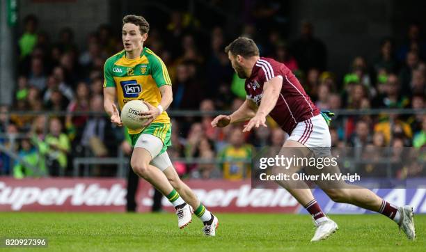 Sligo , Ireland - 22 July 2017; Eoin McHugh of Donegal in action against Damien Comer of Galway during the GAA Football All-Ireland Senior...