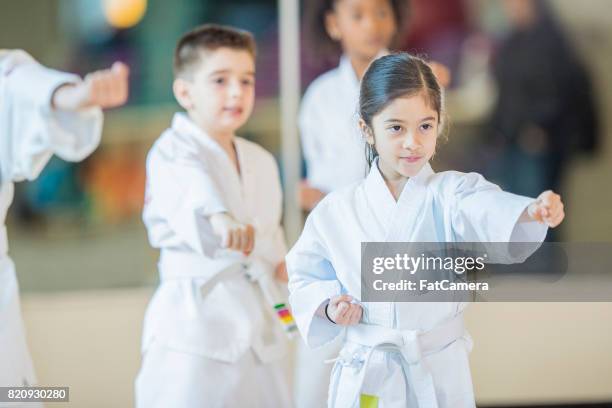 punching - martial arts belt stock pictures, royalty-free photos & images