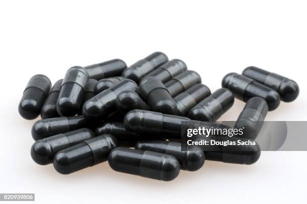 nutritional capsules on a white background - black market bildbanksfoton och bilder