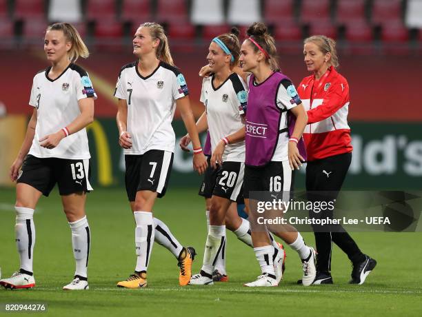 Lisa Makas of Austria is congratulted by her team mates as she leaves the field at half time during the UEFA Women's Euro 2017 Group C match between...