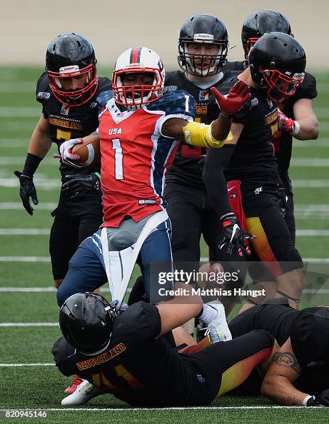 Homri Homri Kerim of Germany tears down the trousers of Deante Battle of ...