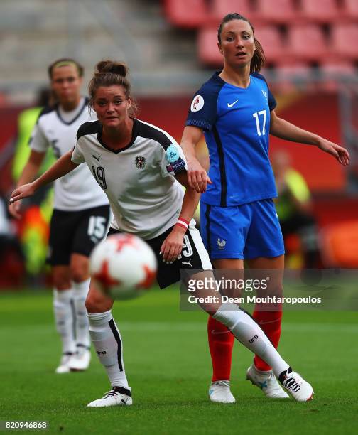 Gaetane Thiney of France battles for the ball with Verena Aschauer of Austria during the Group C match between France and Austria during the UEFA...