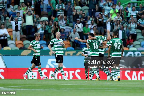 Sporting CP forward Bas Dost from Holland celebrates scoring Sporting second goal with his team mates during the Friendly match between Sporting CP...