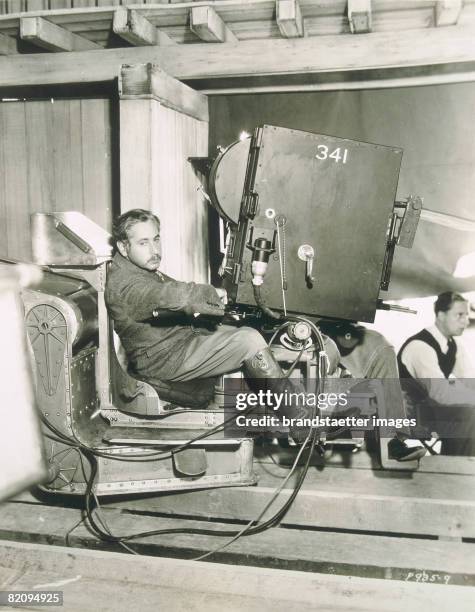 The Austrian Film-director Josef von Sternberg at a shooting, Photograph around 1940 [Der ?sterreichsiche Filmregisseur Josef von Sternberg bei...