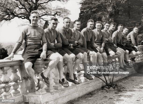 Football players of English football club Huddersfield Town, After their soccer practice at the Northwood Hotel near London, Photograph 4, 1938...