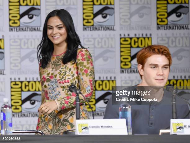 Actors Camila Mendes and K.J. Apa speak onstage at "Riverdale" special video presentation and Q+A during Comic-Con International 2017 at San Diego...