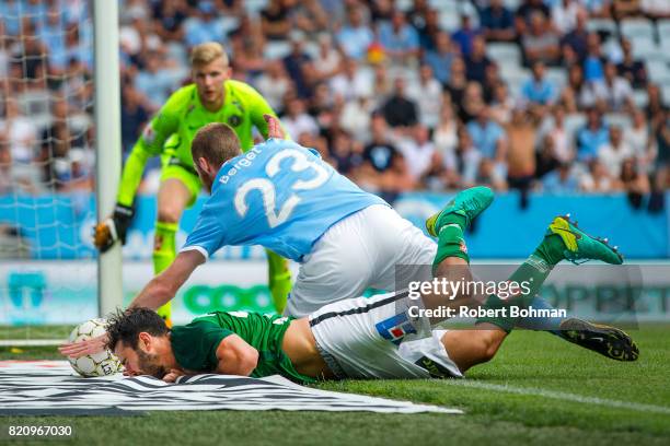 Andre Calisir of Jonkopings Sodra and Jo Inge Berget of Malmo FF during the Allsvenskan match between Malmo FF and Jonkopings Sodra IF at Swedbank...