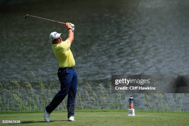 Scott Stallings of the United States plays his shot from the eighth tee during the third round of the Barbasol Championship at the Robert Trent Jones...