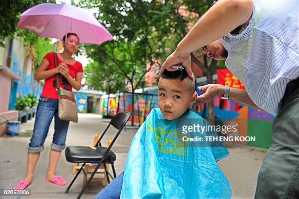 20 New Hair Styles For Boys Photos and Premium High Res Pictures - Getty  Images