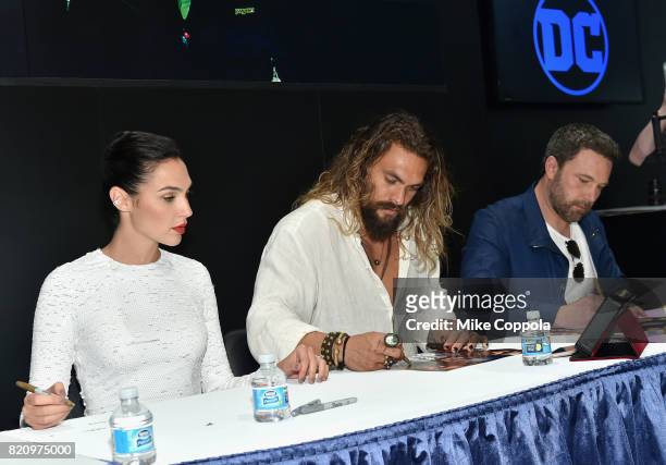 Actors Gal Gadot, Jason Momoa and Ben Affleck during the "Justice League" autograph signing at Comic-Con International 2017 at San Diego Convention...