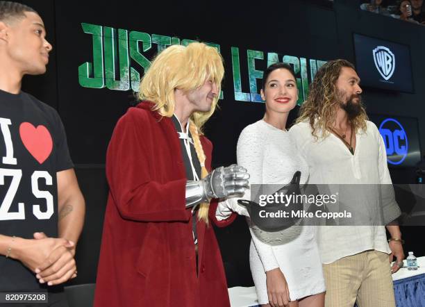 Actors Ray Fisher, Ezra Miller, Gal Gadot, and Jason Momoa during the "Justice League" autograph signing at Comic-Con International 2017 at San Diego...