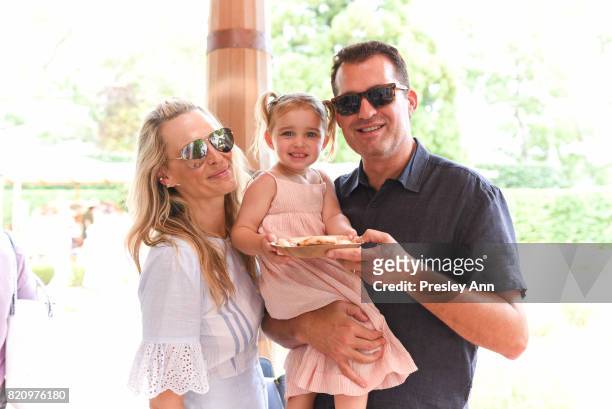 Molly Sims, Scarlett May Stuber and Scott Stuber attend Third Annual Green Beetz Day at The Creeks on July 22, 2017 in East Hampton, New York.