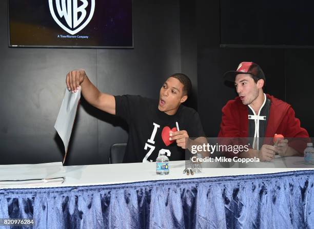 Actors Ray Fisher and Ezra Miller greet fans during the "Justice League" autograph signing at Comic-Con International 2017 at San Diego Convention...