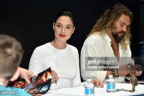 Actors Gal Gadot and Jason Momoa during the "Justice League" autograph signing at Comic-Con International 2017 at San Diego Convention Center on July...