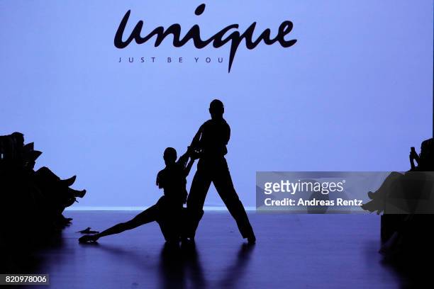 Rebecca Mir and Massimo Sinato dance on the runway at the Unique show during Platform Fashion July 2017 at Areal Boehler on July 22, 2017 in...