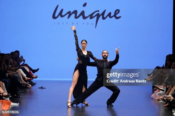 Rebecca Mir and Massimo Sinato dance on the runway at the Unique show during Platform Fashion July 2017 at Areal Boehler on July 22, 2017 in...