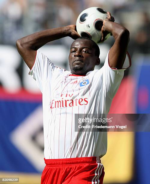 Thimothee Atouba of Hamburg takes a throw on during a pre season friendly match between Hamburger SV and Manchester City at the HSH Nordbank Arena on...